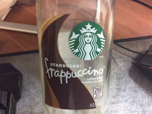 Image de caffe dans une bouteille de vitre